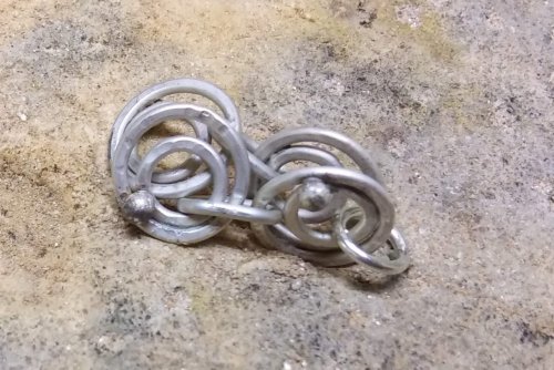 Judy Larson's Making Chain with Wubbers and Wire - , Contemporary Wire Jewelry, Making Chain, Chain Making , Butane Torch, Soldering, Solder, Heat until the solder flows.